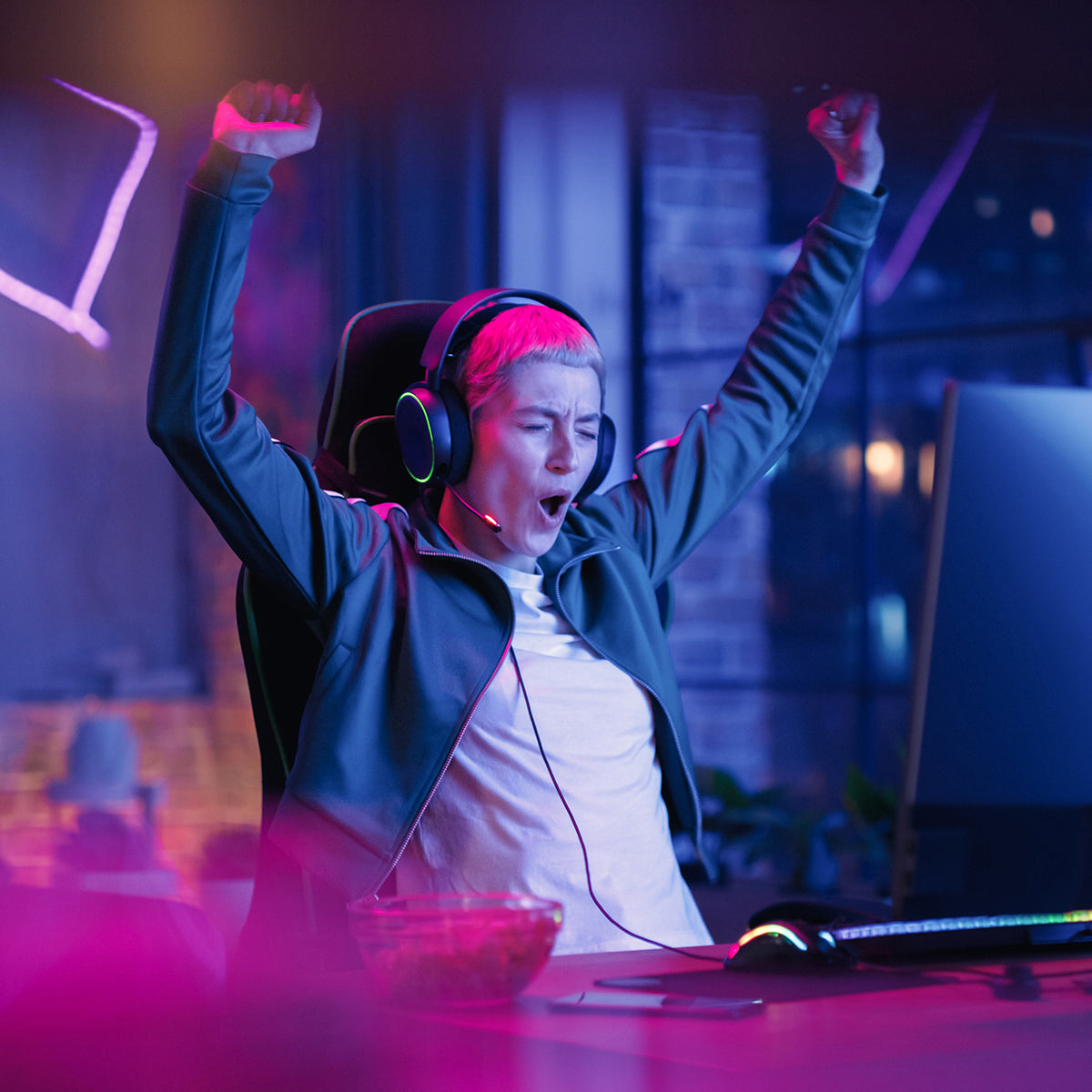 A game player wearing headphones has won the game
